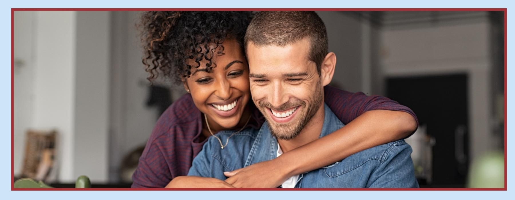 a man and woman embracing